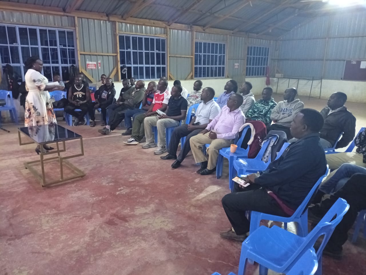 Mercy facilitating a men's community forum